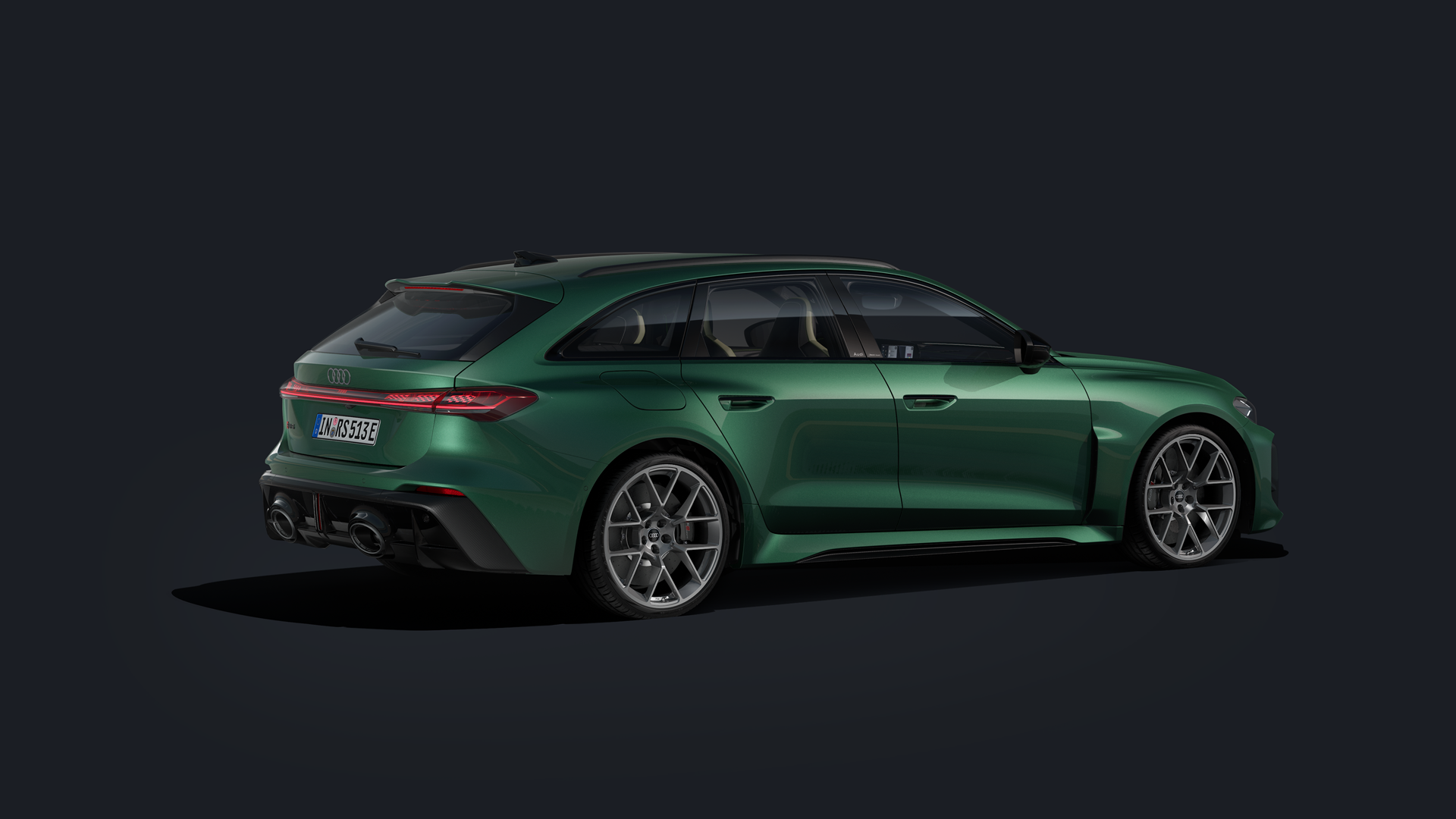 Der RS 5 Avant von der Seite mit Individuallackierung in Avocadogrün und 21-Zoll-Rädern im 6-Doppelspeichen-Design.